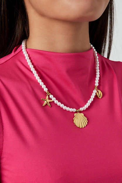 Perlenkette mit Meeresanhängern - Goldfarben