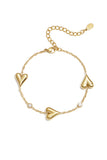 Armband mit drei massiven Herzen und Steinen