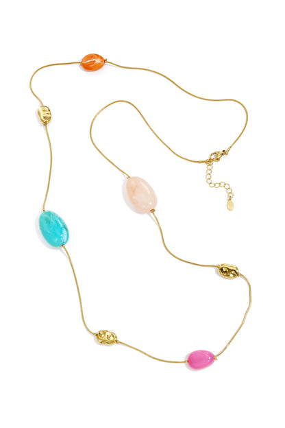 Long necklace with varying beads and shapes