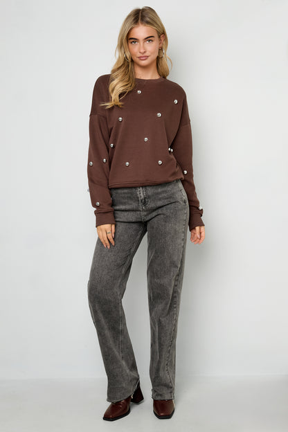Der Nietenpullover