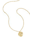 Necklace with flat details and large pendant